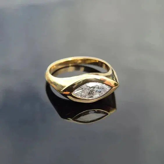 Anello vintage con zirconia marquise e banda in rame oro